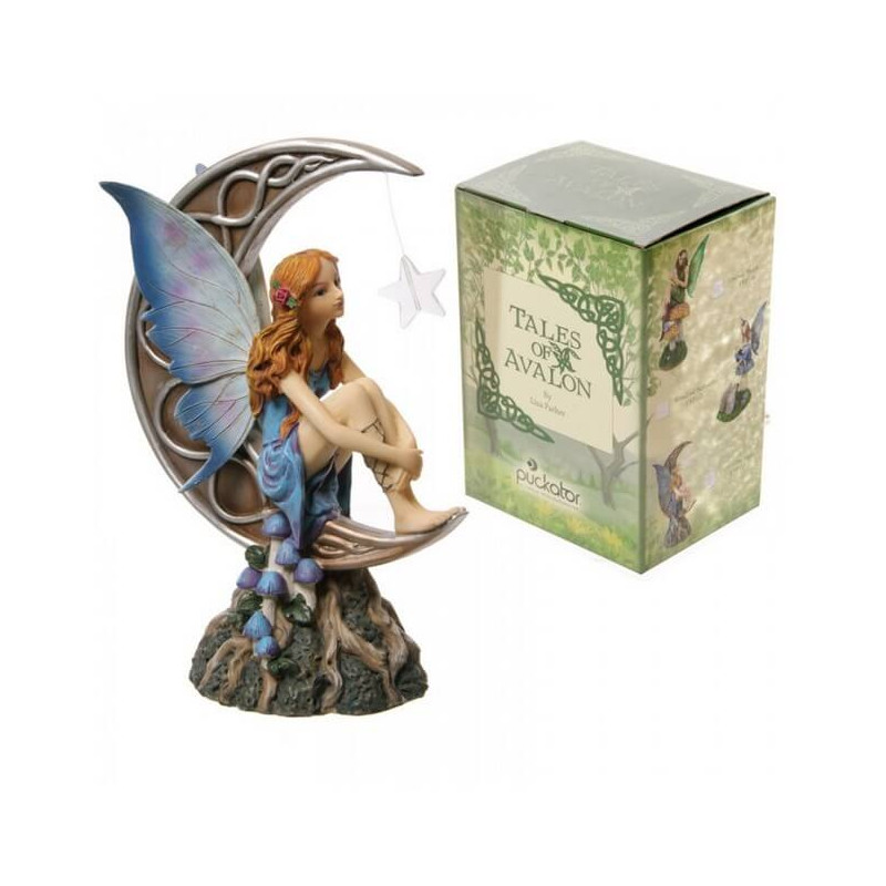 statuette fee avec une lune
