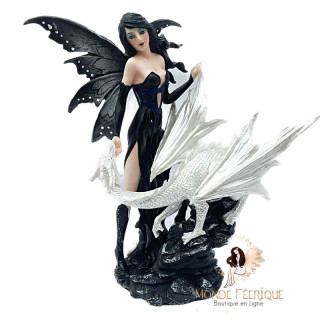 statuette fee avec un dragon