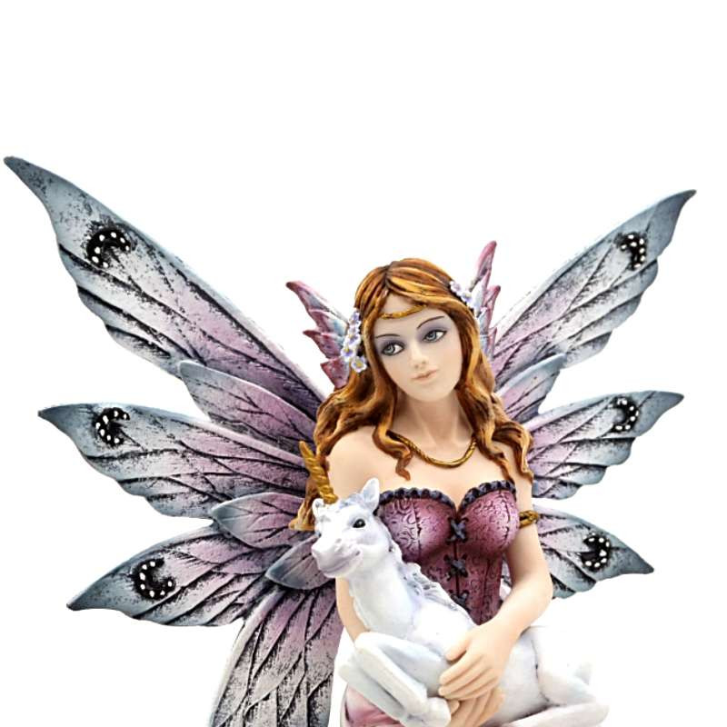 fIGURINE de Fée avec une Licorne