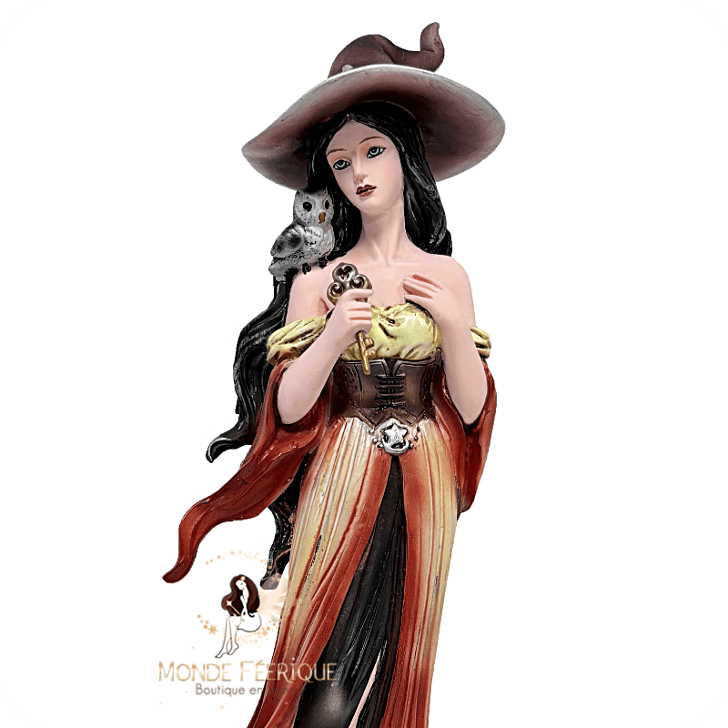 Sorcière orange et hibou doré – Figurine lumineuse